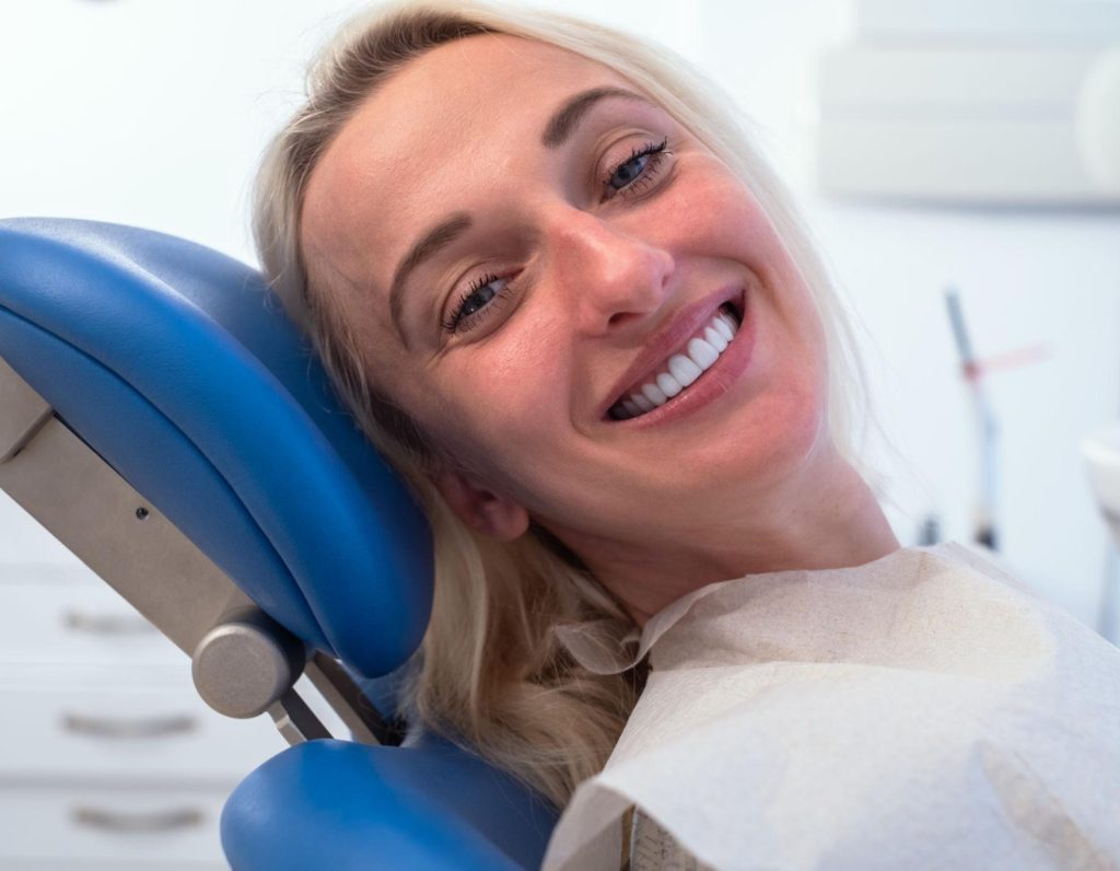 Happy patient after dental care near Crawford Plains
